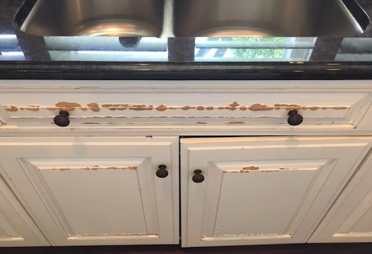 Scratched cabinet doors requiring gentle repair or refinishing